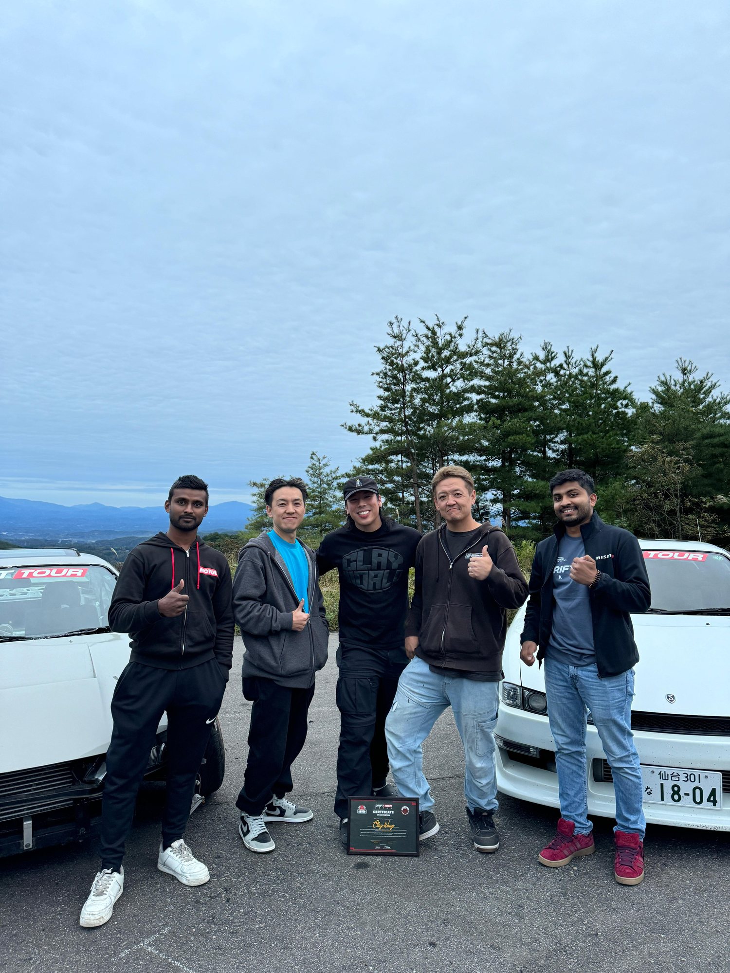 The Drift Tour Japan crew with their drift cars